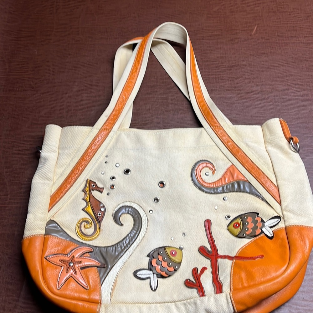 Used Prada canvas leather tote cream some wear please reference pictures